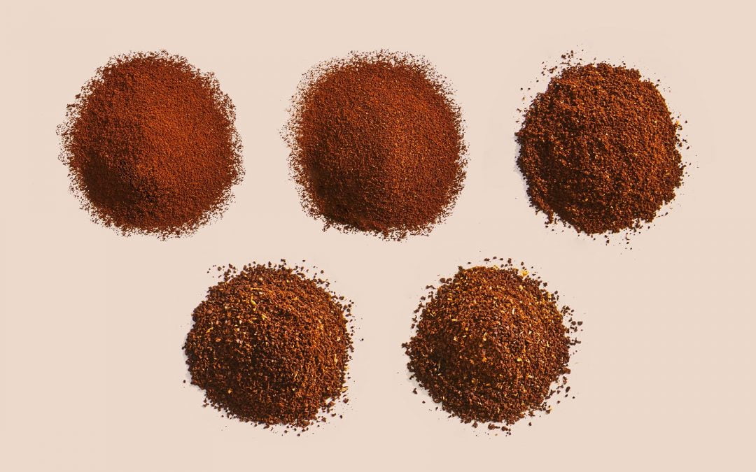 Different sizes of coffee grinds to show differences in taste