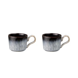 Blue and black espresso cups on a white background